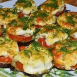 Eggplants with mushrooms baked in the oven