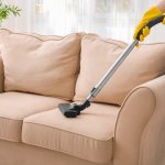 cleaning a sofa at home