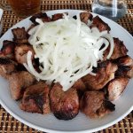 Photo of kebab with onions