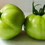 Where and how to store green tomatoes so that they turn red as quickly as possible and how to preserve ripe fruits for a long time