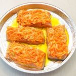 Pink salmon in the oven with carrots and onions with cheese, mayonnaise, sour cream, step by step