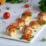 Chicken rolls in bacon in the oven. Recipe with stuffing, cheese, mushrooms, ham in creamy, soy, sour cream sauce 