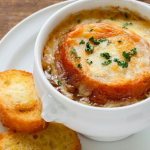 Onion soup. Simple recipe with melted cheese, classic 