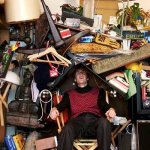 Guy in a pile of junk