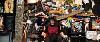 Guy in a pile of junk