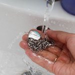After cleaning silver using any of the described methods, rinse it thoroughly with clean water.