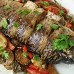 Fish baked in the oven with vegetables