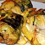 Mackerel baked in the oven with vegetables and cheese