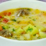 Soup with vegetables in meat broth is a very tasty and aromatic dish