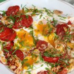 Scrambled eggs with tomatoes and onions